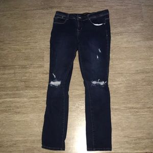 Dark wash distressed skinny jeans